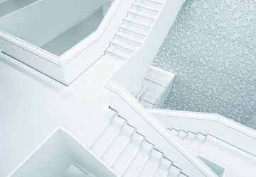 diverging white staircases