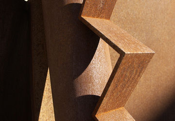 abstract bronze sculpture outside of Sequoia Hall